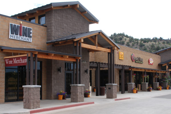 nature's oasis grocery store with open timber beams and colorado mountain style architecture