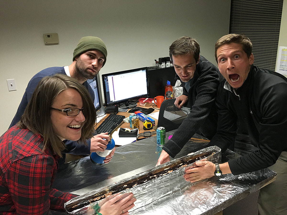 Team making a gingerbread bridge