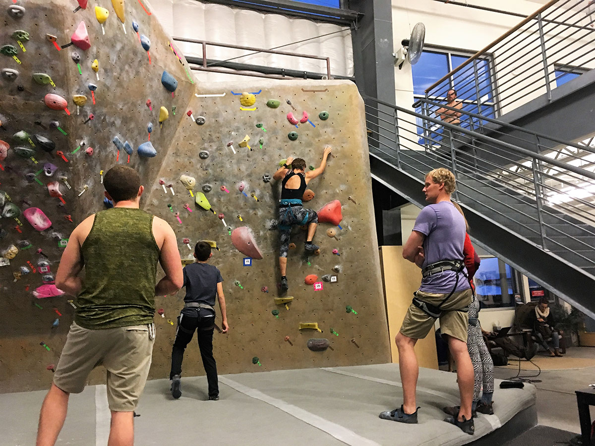 Team members at a climbing gym